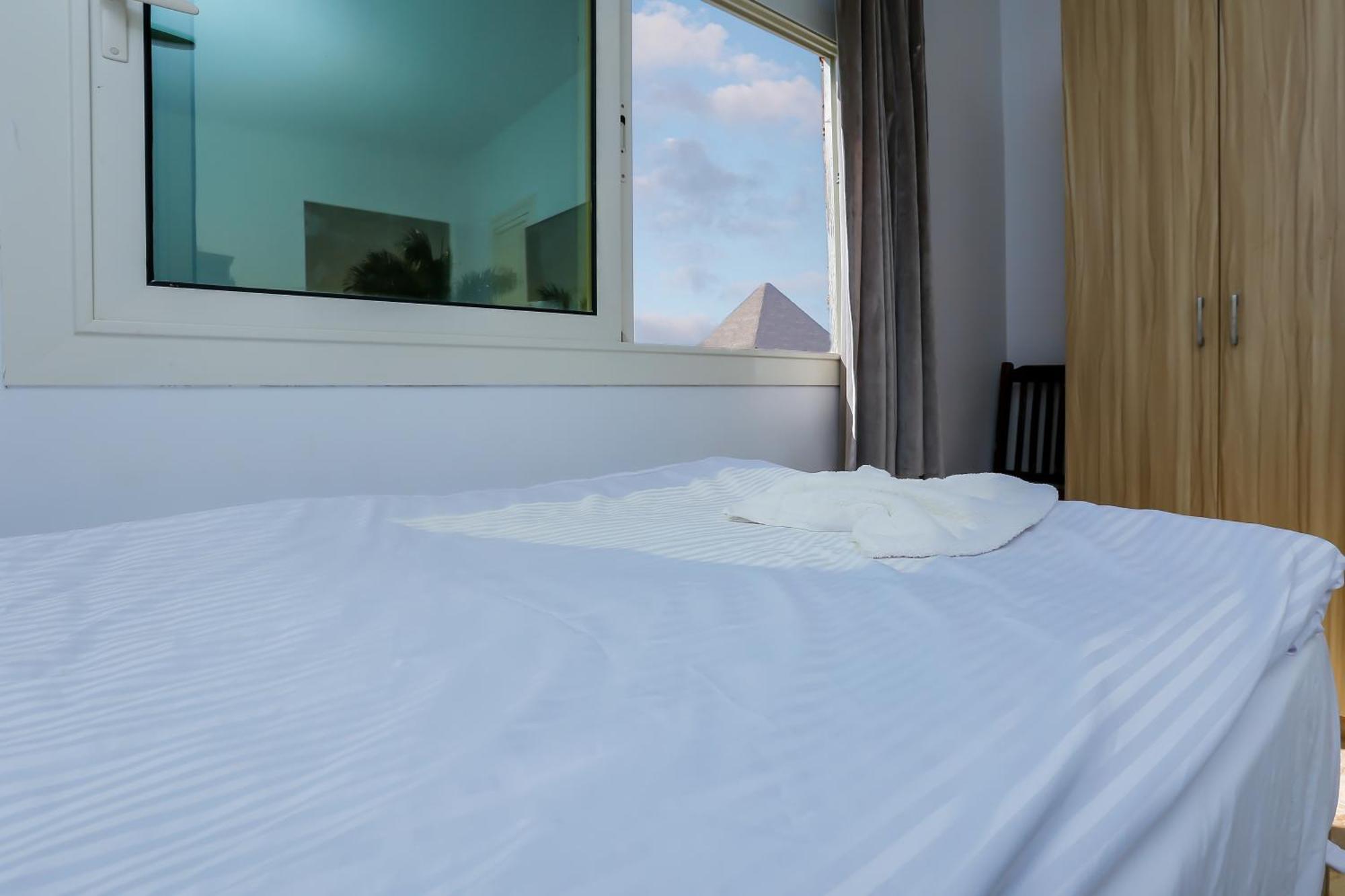 Pyramids Express View Hotel Kafret el-Gabal Екстериор снимка